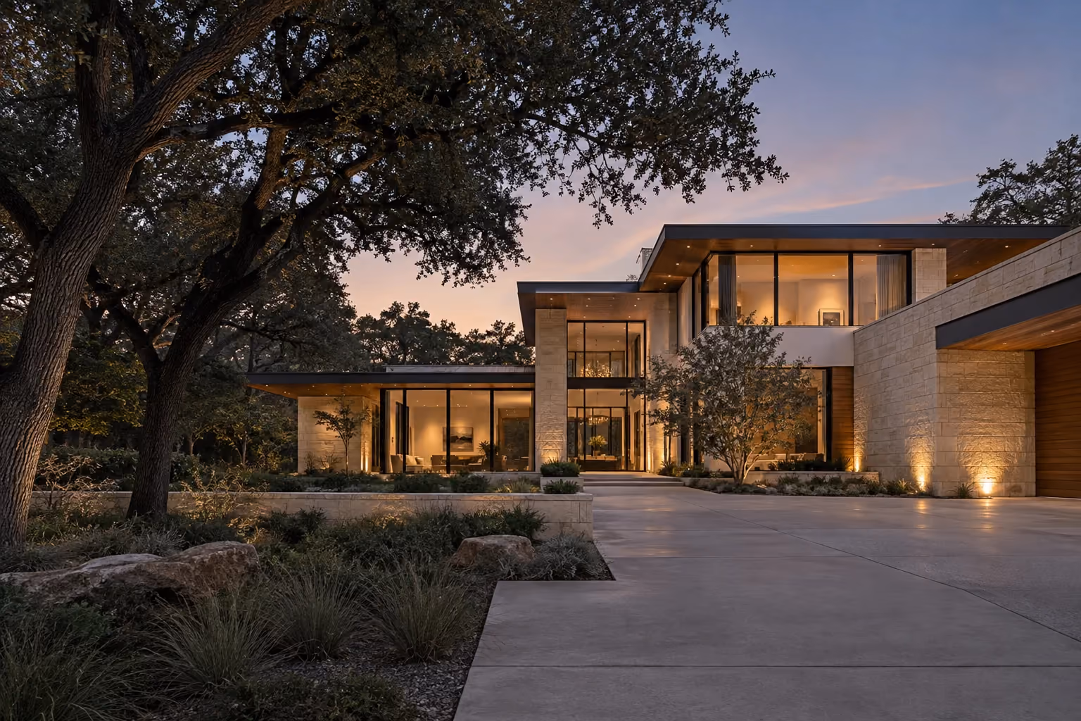Illustrative contemporary home concept with limestone, broad glazing and mature trees